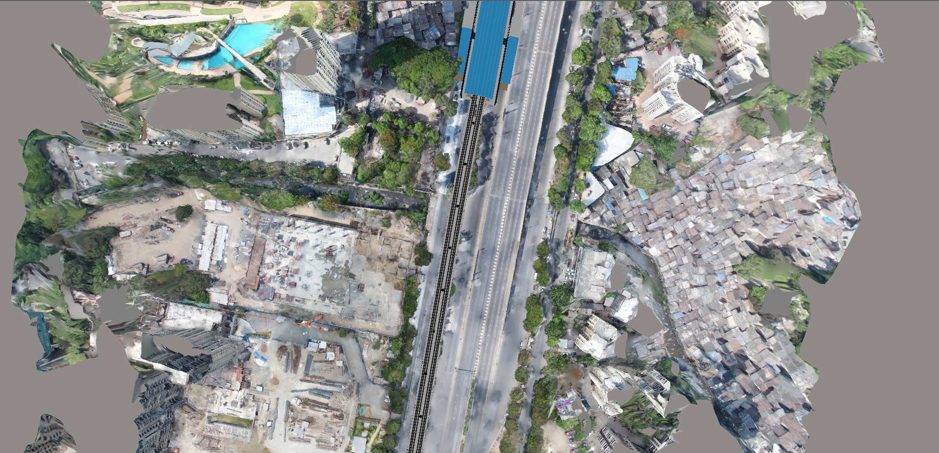 LiDAR point cloud visualization of the Mumbai Metro corridor showing roads, buildings, vegetation, and surrounding urban infrastructure captured for Digital Twin development.